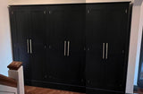 A 6-door hall coat and shoe storage cupboard with a top box and additional storage.
