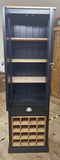 Black cabinet with wooden shelves and wine rack on a wooden floor.