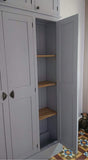 A white 5-door hall coat and shoe storage cupboard with a top box and additional storage.