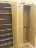 A yellow 5-door hall coat and shoe storage cupboard with a top box and additional storage.