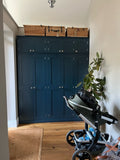 A blue 5-door hall coat and shoe storage cupboard with a top box and additional storage.