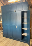 A blue 5-door hall coat and shoe storage cupboard with a top box and additional storage.