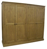 A hand waxed 4 door hall coat and shoe storage cupboard with wooden knobs, hooks on the sides, and visible shelves.