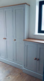Shallow Hallway Storage Cupboard with Coat & Shoe Storage

Designed for homes where space is limited, this shallow 3 door hallway cupboard with 2 door shoe storage offers a smart and stylish storage solution. At just 25 cm deep, it’s perfect for narrow hallways, cloakrooms, and utility spaces—without compromising on functionality.

Handcrafted in the UK from solid pine, this unit combines coat hanging space and shoe storage in one beautifully designed piece, finished in your choice of paint or wood finish.